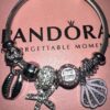 PULSERA PANDORA CON CHARMS